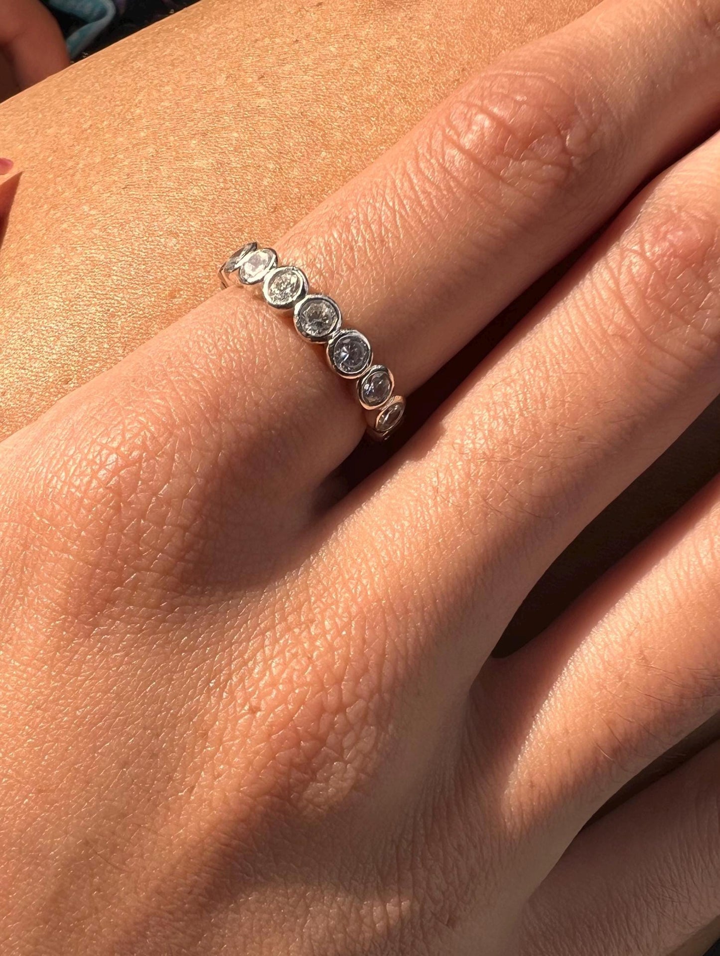 Sterling Silver Eternity Band: Round Cubic Zirconia Bezel Ring