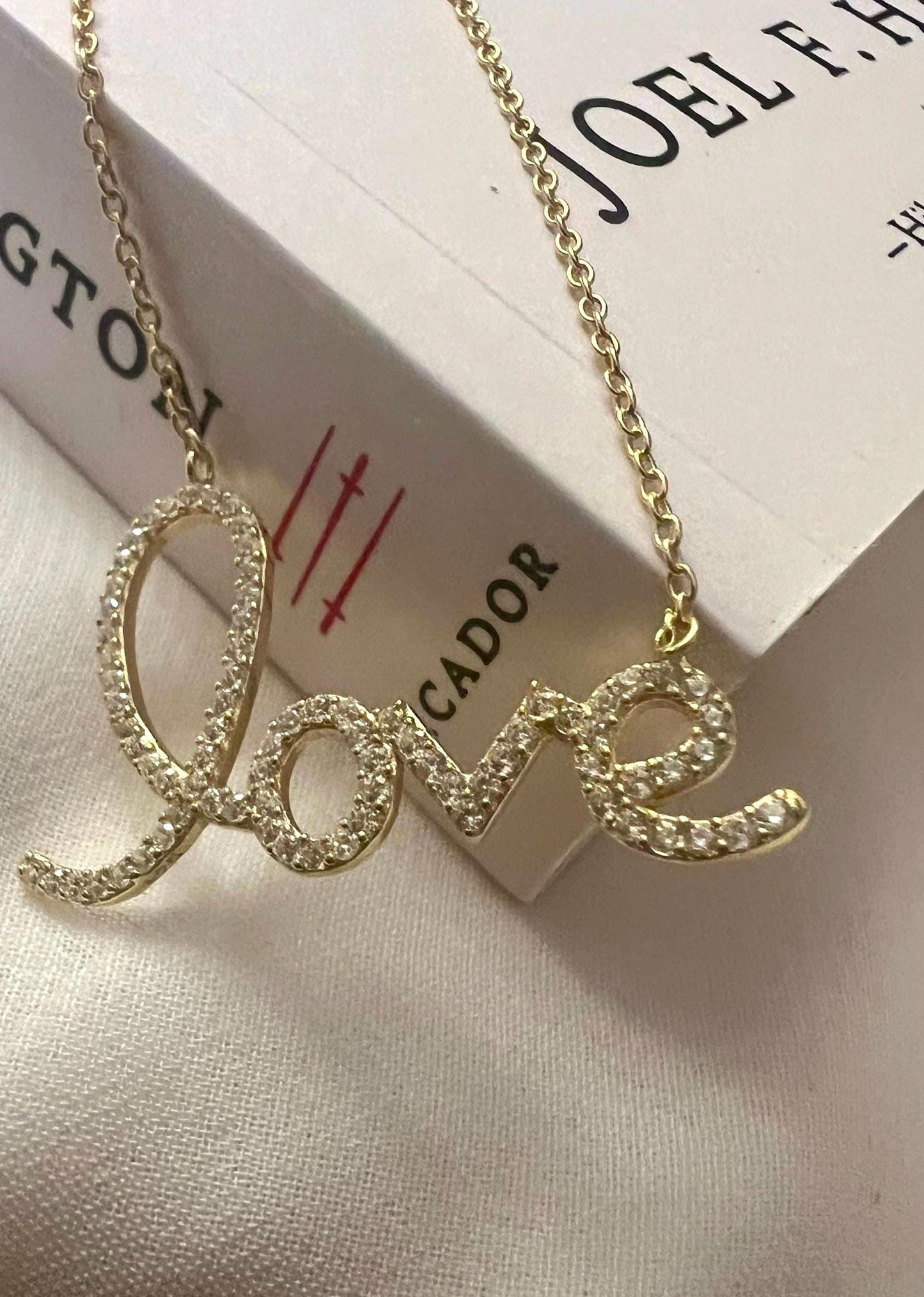 Gold Plated Love Script Necklace: Cubic Zirconia Accent