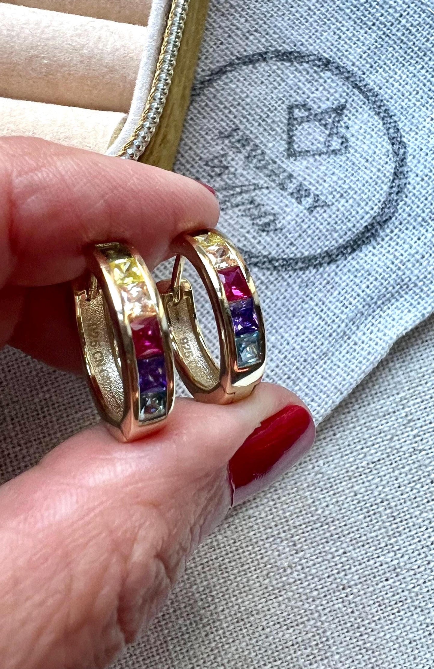 Rainbow CZ Huggie Earrings: 14K Gold Plated Sterling Silver
