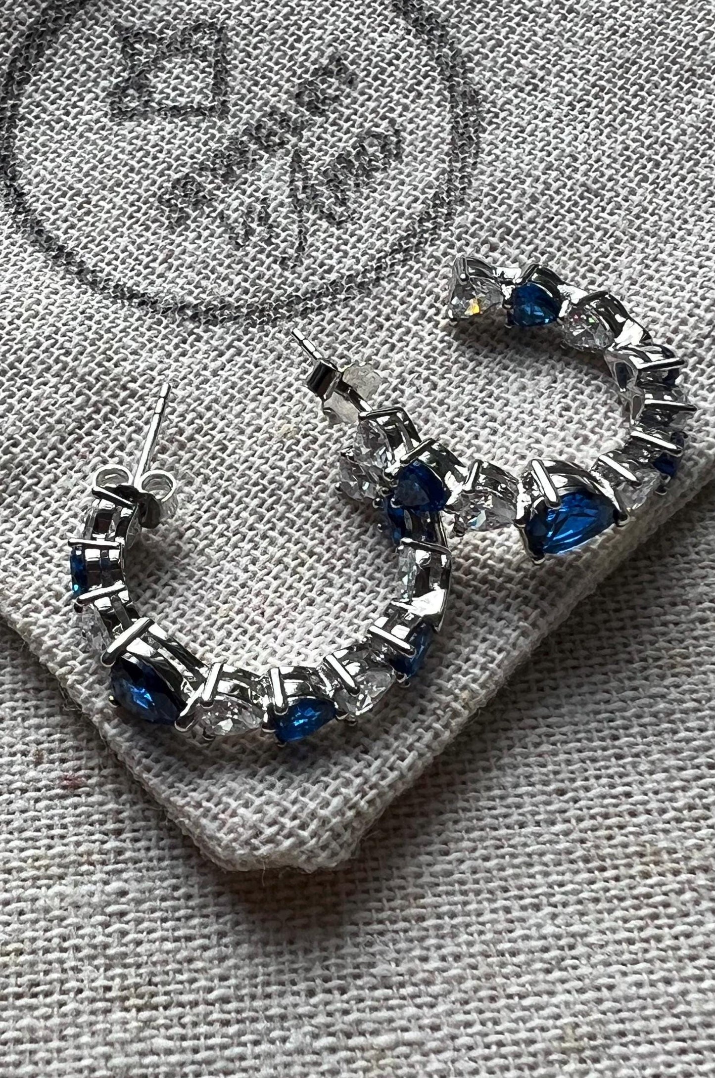Sterling Silver Heart Hoop Earrings: Blue & Clear CZ Inside Out Design
