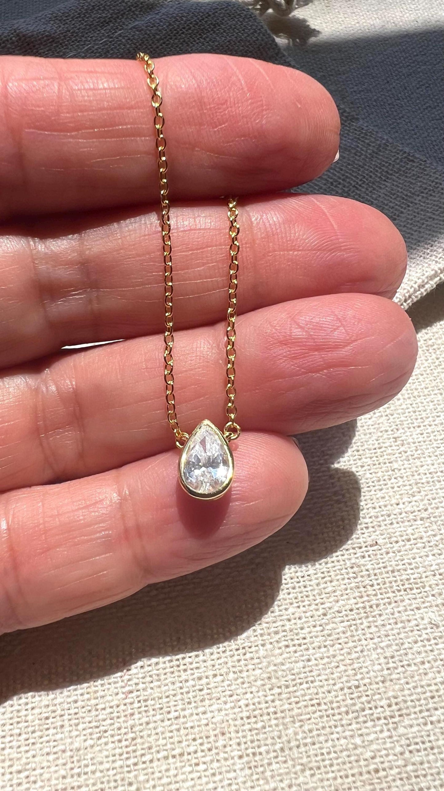 Gold Pear Solitaire Necklace: 14K Plated Sterling Silver CZ Pendant